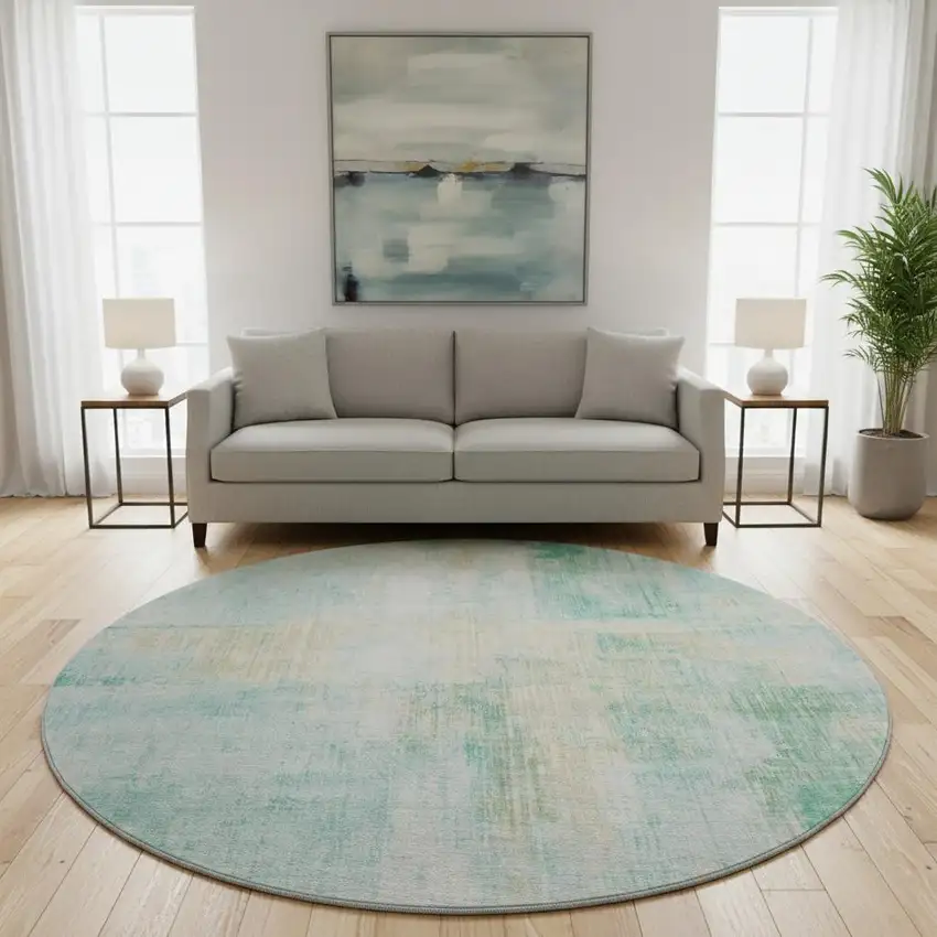 8' Teal And Ivory Abstract Washable Round Rug With UV Protection Photo 2