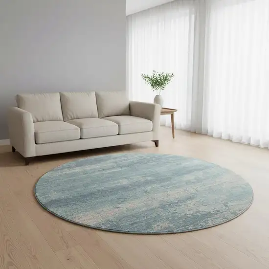 8' Teal And Ivory Abstract Washable Round Rug With UV Protection Photo 2