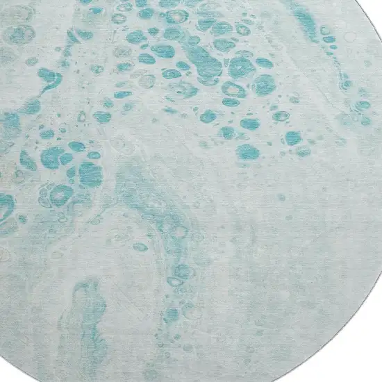 8' Teal And Ivory Abstract Washable Round Rug With UV Protection Photo 3