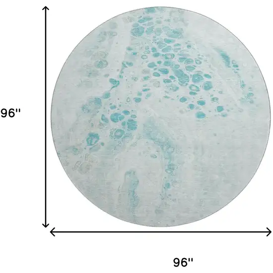 8' Teal And Ivory Abstract Washable Round Rug With UV Protection Photo 9