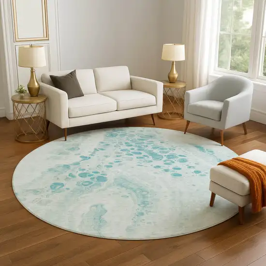8' Teal And Ivory Abstract Washable Round Rug With UV Protection Photo 5