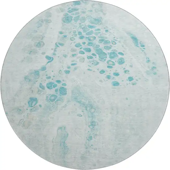 8' Teal And Ivory Abstract Washable Round Rug With UV Protection Photo 1