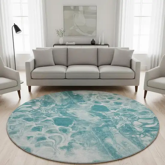 8' Teal And Ivory Abstract Washable Round Rug With UV Protection Photo 2
