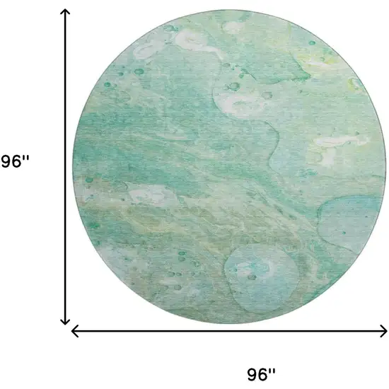 8' Teal And Ivory Abstract Washable Round Rug With UV Protection Photo 9