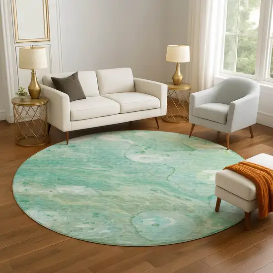 8' Teal And Ivory Abstract Washable Round Rug With UV Protection Photo 5