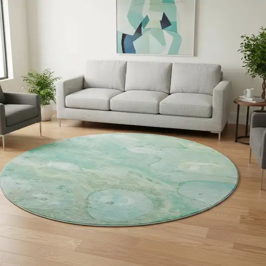 8' Teal And Ivory Abstract Washable Round Rug With UV Protection Photo 2