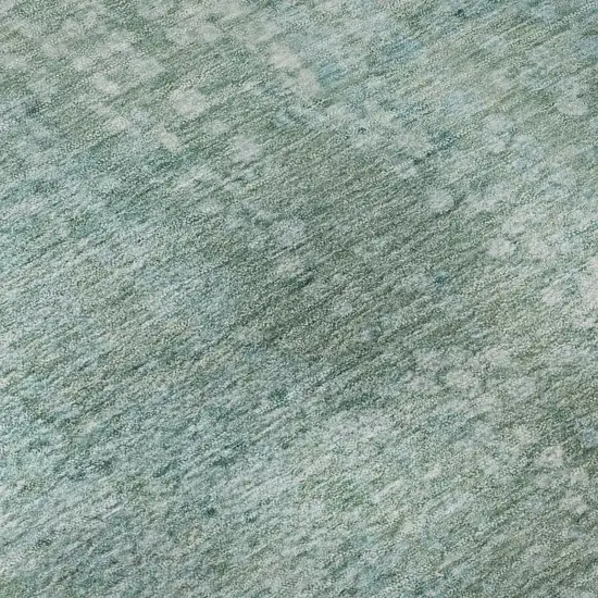 8' Teal And Ivory Abstract Washable Round Rug With UV Protection Photo 7