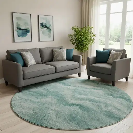 8' Teal And Ivory Abstract Washable Round Rug With UV Protection Photo 2