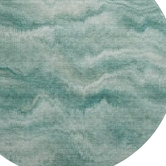 8' Teal And Ivory Abstract Washable Round Rug With UV Protection Photo 3