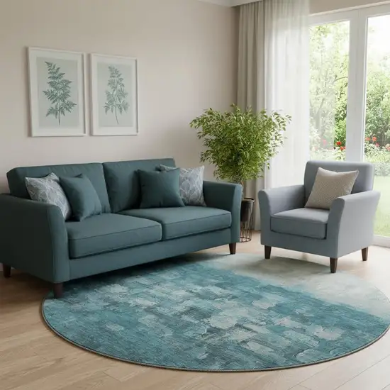 8' Teal And Ivory Abstract Washable Round Rug With UV Protection Photo 2