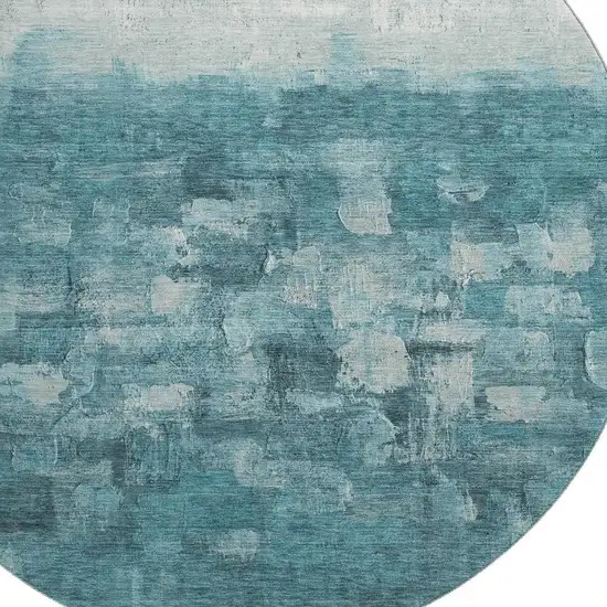 8' Teal And Ivory Abstract Washable Round Rug With UV Protection Photo 3