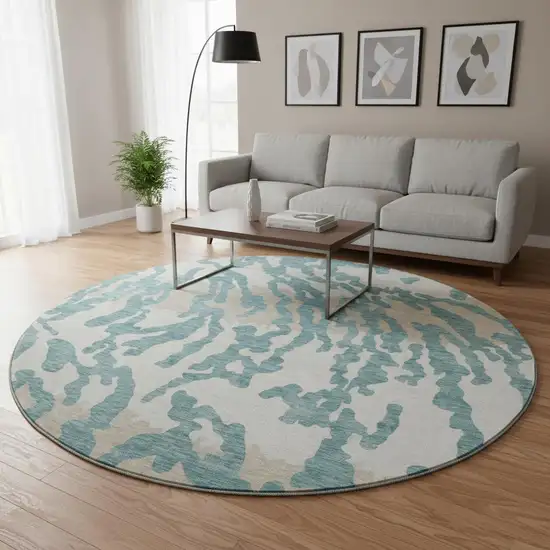 8' Teal And Ivory Animal Print Washable Round Rug With UV Protection Photo 2
