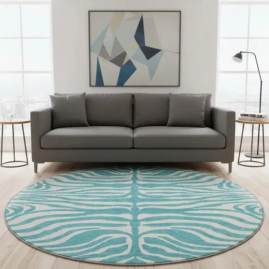 8' Teal And Ivory Animal Print Washable Round Rug With UV Protection Photo 2