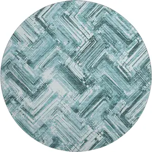 Photo of 8' Teal And Ivory Chevron Washable Round Rug With UV Protection