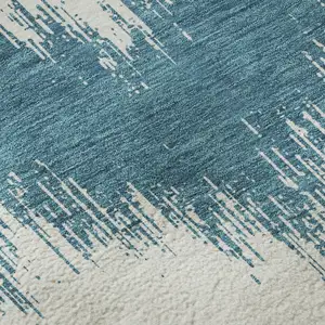 Photo of 8' Teal And Ivory Chevron Washable Round Rug With UV Protection