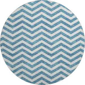 Photo of 8' Teal And Ivory Chevron Washable Round Rug With UV Protection