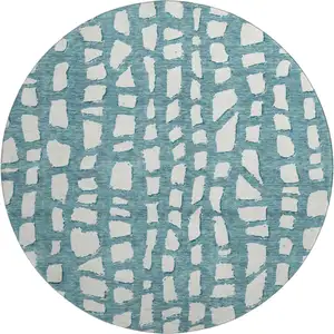 Photo of 8' Teal And Ivory Cobblestone Washable Round Rug With UV Protection