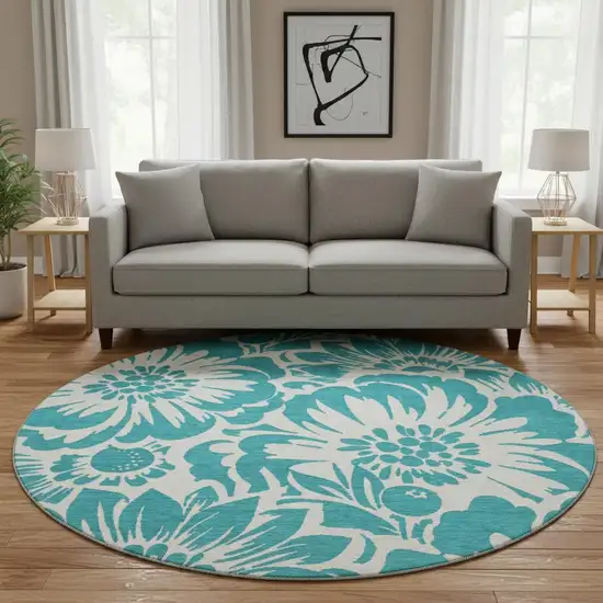 8' Teal And Ivory Floral Washable Round Rug With UV Protection Photo 1