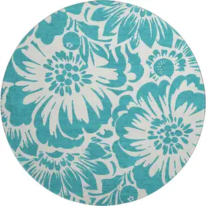 Photo of 8' Teal And Ivory Floral Washable Round Rug With UV Protection