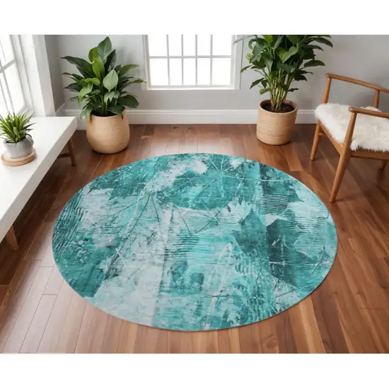 8' Teal And Ivory Floral Washable Round Rug With UV Protection Photo 2