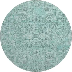 Photo of 8' Teal And Ivory Floral Washable Round Rug With UV Protection