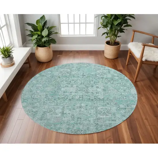 8' Teal And Ivory Floral Washable Round Rug With UV Protection Photo 2