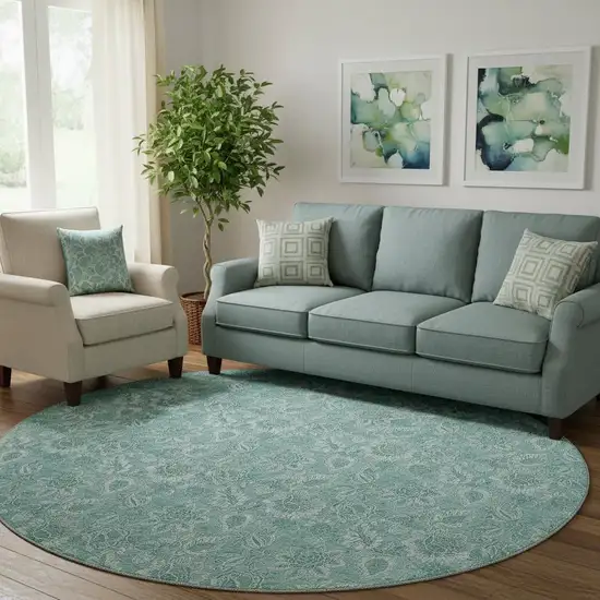 8' Teal And Ivory Floral Washable Round Rug With UV Protection Photo 1