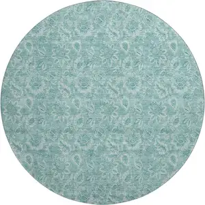 Photo of 8' Teal And Ivory Floral Washable Round Rug With UV Protection
