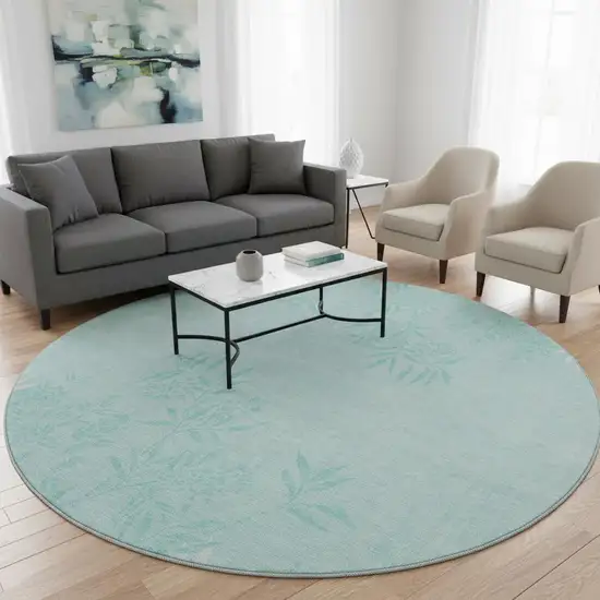 8' Teal And Ivory Floral Washable Round Rug With UV Protection Photo 2