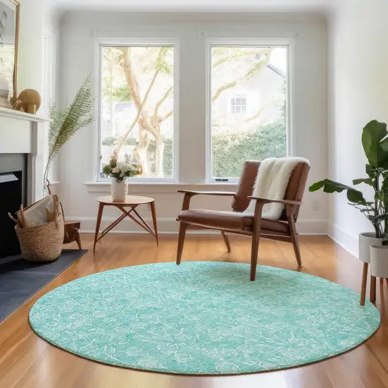 8' Teal And Ivory Floral Washable Round Rug With UV Protection Photo 4