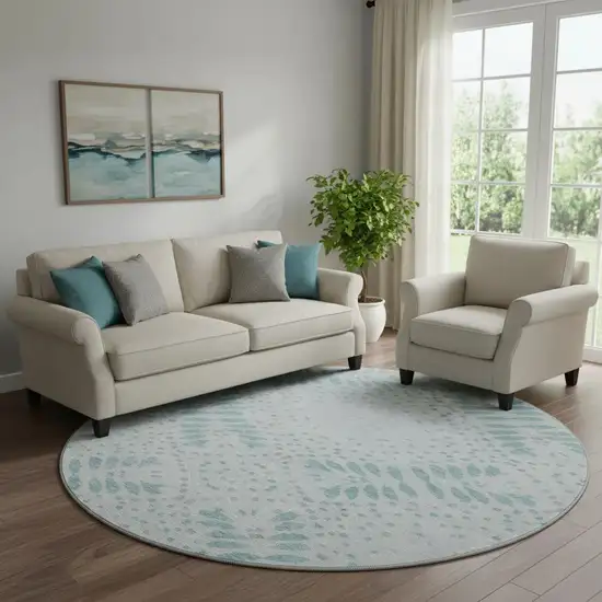 8' Teal And Ivory Floral Washable Round Rug With UV Protection Photo 1
