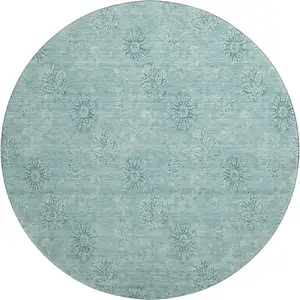 Photo of 8' Teal And Ivory Floral Washable Round Rug With UV Protection