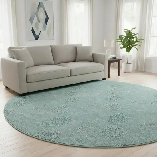8' Teal And Ivory Floral Washable Round Rug With UV Protection Photo 2