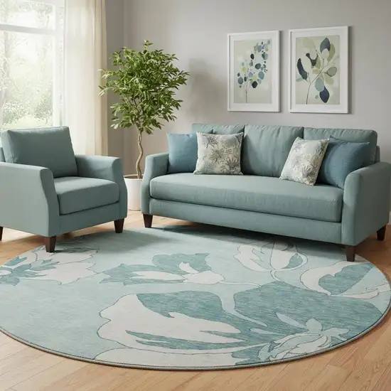 8' Teal And Ivory Floral Washable Round Rug With UV Protection Photo 1