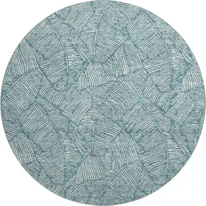 Photo of 8' Teal And Ivory Floral Washable Round Rug With UV Protection