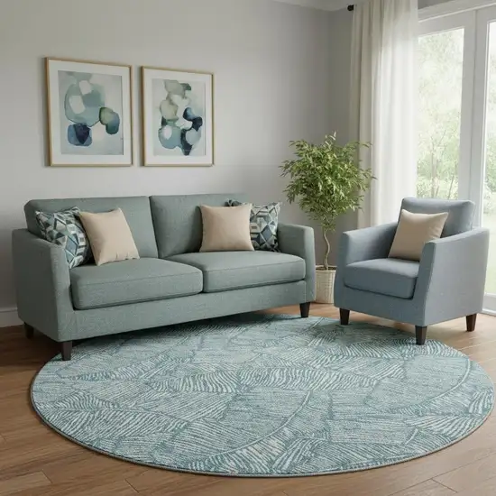 8' Teal And Ivory Floral Washable Round Rug With UV Protection Photo 1