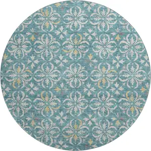 Photo of 8' Teal And Ivory Floral Washable Round Rug With UV Protection