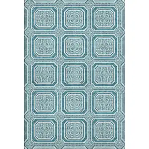 Photo of 8' Teal And Ivory Geometric Washable Area Rug With UV Protection