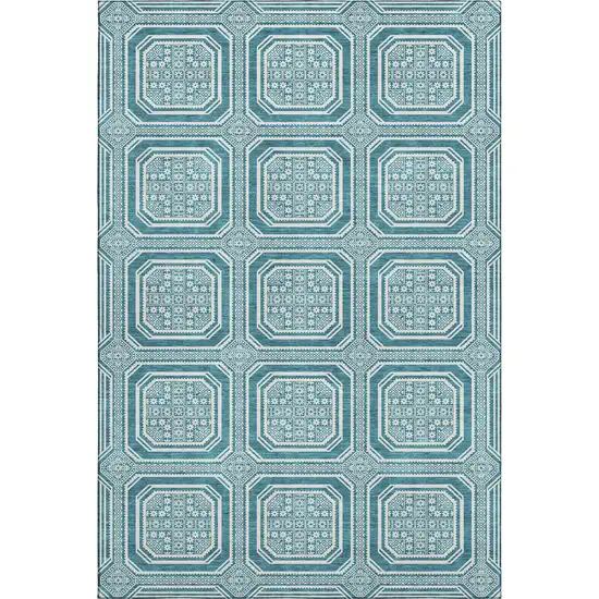 8' Teal And Ivory Geometric Washable Area Rug With UV Protection Photo 1