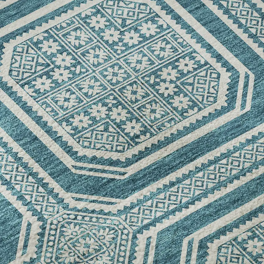 8' Teal And Ivory Geometric Washable Area Rug With UV Protection Photo 9