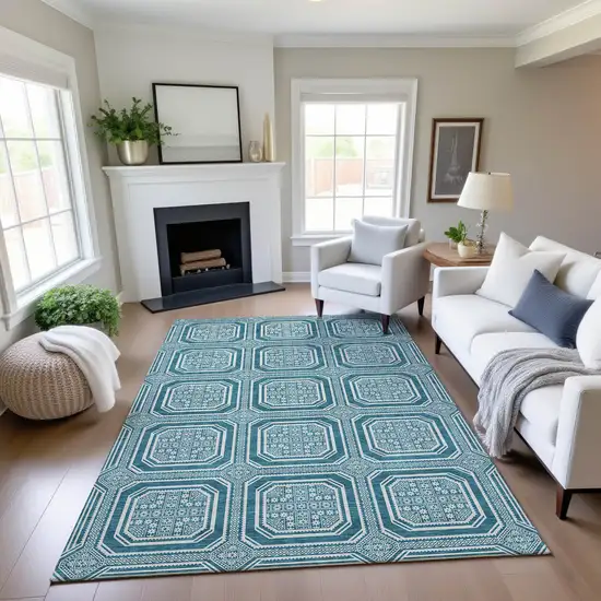 8' Teal And Ivory Geometric Washable Area Rug With UV Protection Photo 4