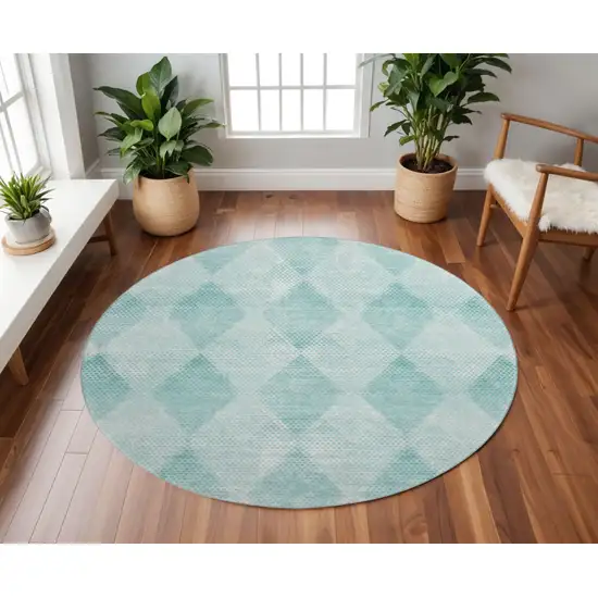 8' Teal And Ivory Geometric Washable Round Rug With UV Protection Photo 2
