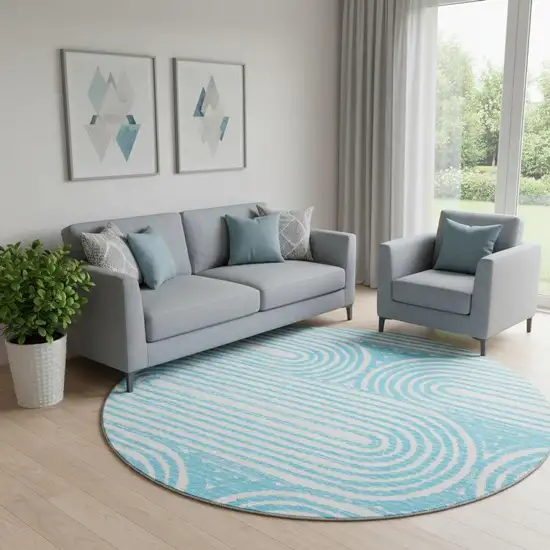 8' Teal And Ivory Geometric Washable Round Rug With UV Protection Photo 1