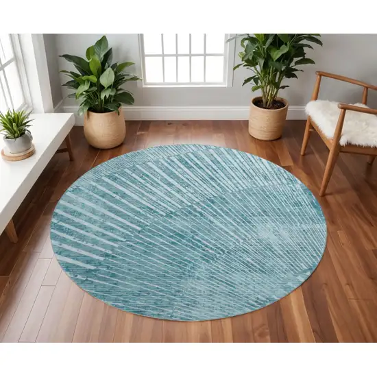 8' Teal And Ivory Geometric Washable Round Rug With UV Protection Photo 2