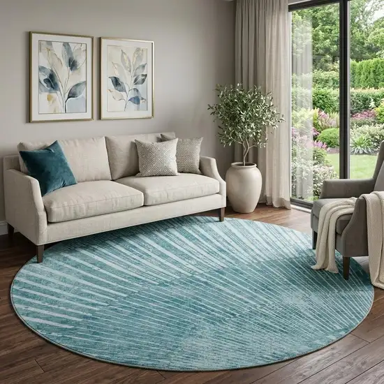 8' Teal And Ivory Geometric Washable Round Rug With UV Protection Photo 1
