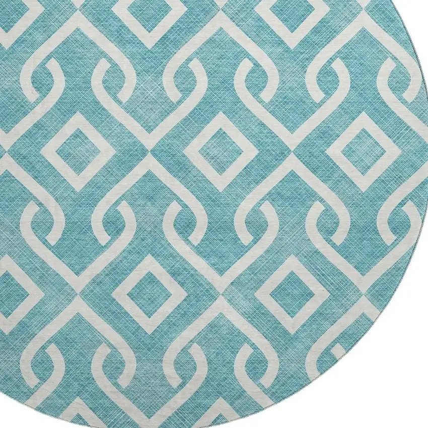 8' Teal And Ivory Geometric Washable Round Rug With UV Protection Photo 3
