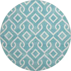 Photo of 8' Teal And Ivory Geometric Washable Round Rug With UV Protection