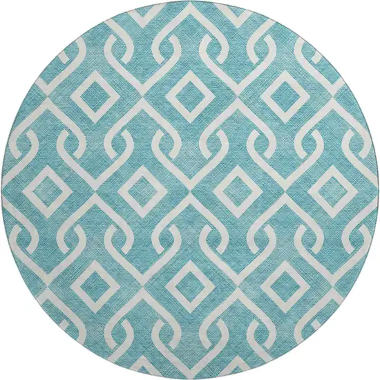 8' Teal And Ivory Geometric Washable Round Rug With UV Protection Photo 1