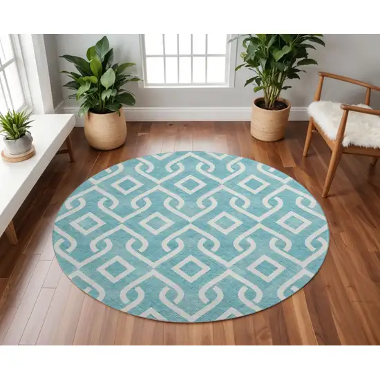 8' Teal And Ivory Geometric Washable Round Rug With UV Protection Photo 2