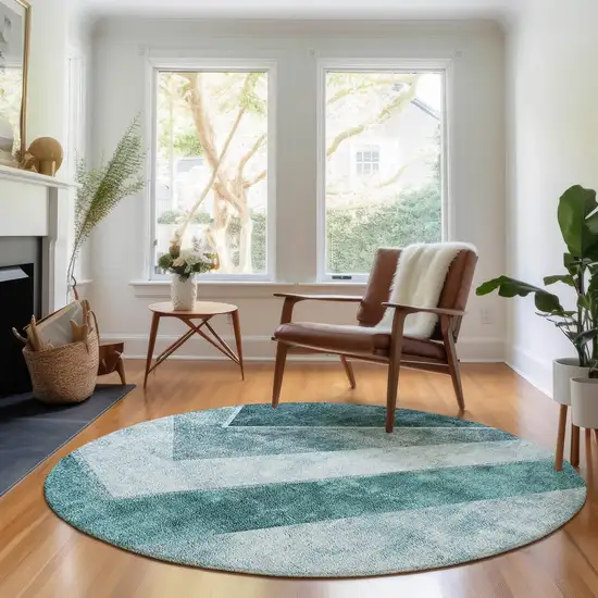 8' Teal And Ivory Geometric Washable Round Rug With UV Protection Photo 4